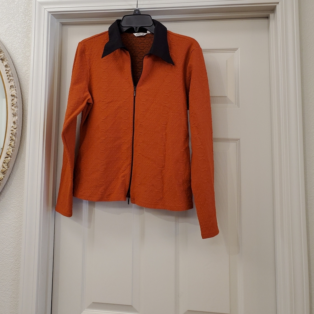Stera ladies blazer is a size Large